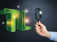 Tl